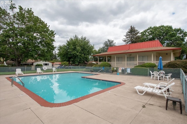 view of pool with a patio area