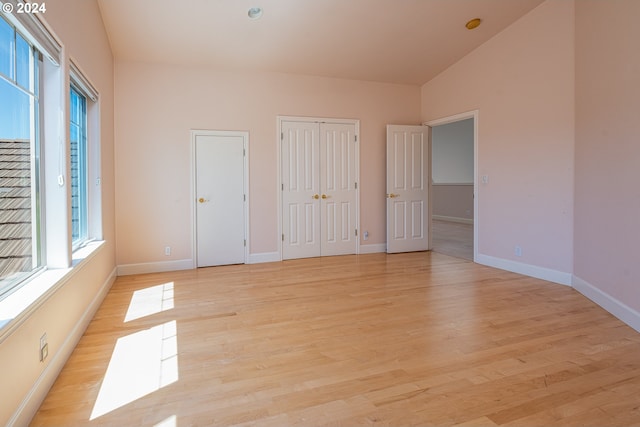 full bathroom with tile patterned floors, toilet, baseboards, an enclosed shower, and vanity