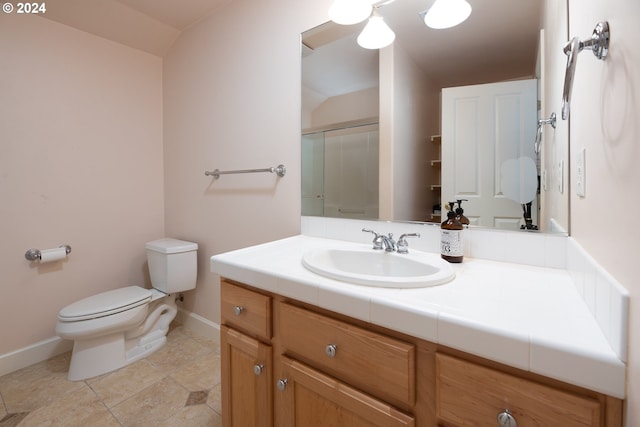 full bath with a shower stall, wood finished floors, toilet, vanity, and a notable chandelier