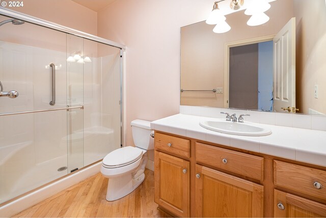 interior space with recessed lighting, light wood finished floors, and baseboards