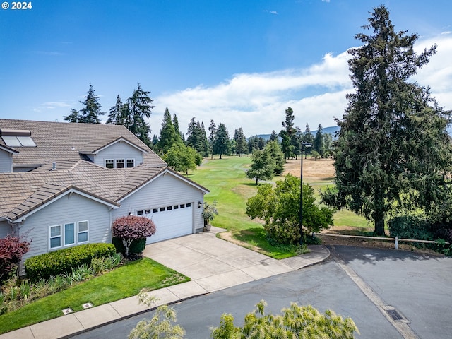 rear view of house with a yard