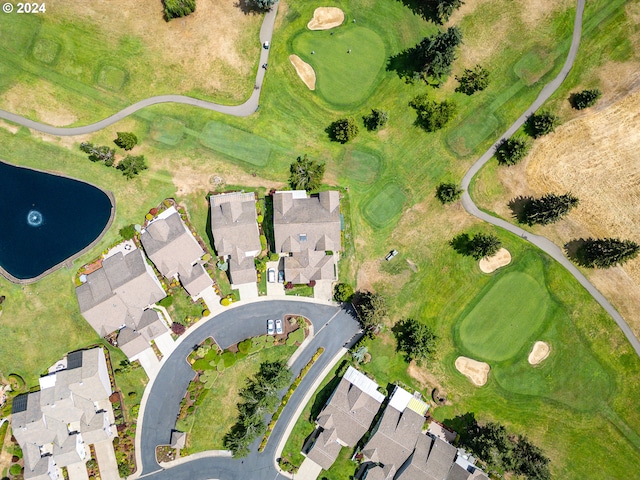 birds eye view of property featuring a residential view and view of golf course