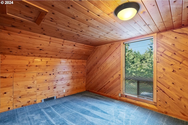 bonus room featuring wooden ceiling, lofted ceiling, wood walls, and carpet floors