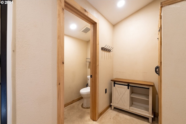 3545 NW Soda Springs Rd, Gales Creek, OR 97117 - bathroom featuring toilet, baseboards, visible vents, and a textured wall