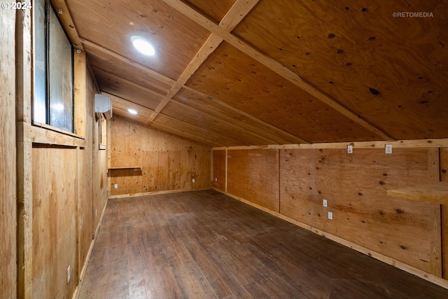 bonus room featuring wooden walls, lofted ceiling, dark hardwood / wood-style flooring, and wood ceiling