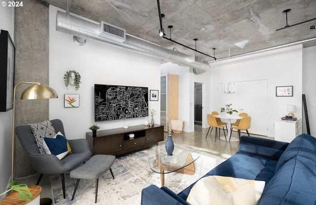 living room with concrete floors