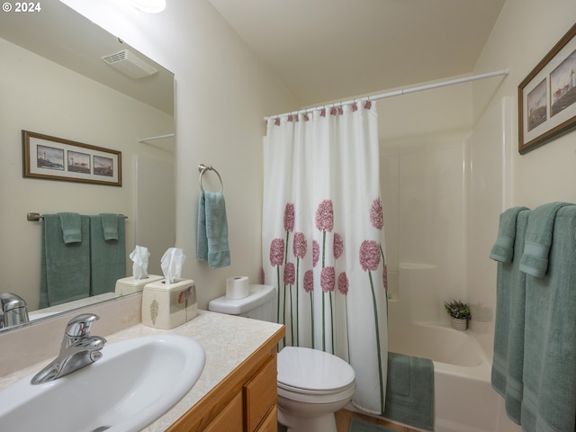 full bath with shower / bathtub combination with curtain, visible vents, vanity, and toilet