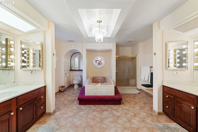 full bathroom with plus walk in shower, tile patterned flooring, and vanity