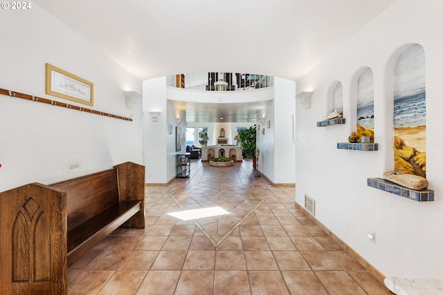 entrance foyer featuring light tile patterned floors