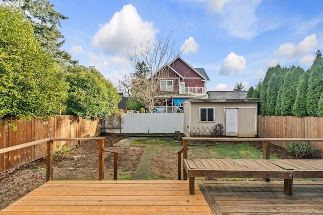 deck featuring a storage shed