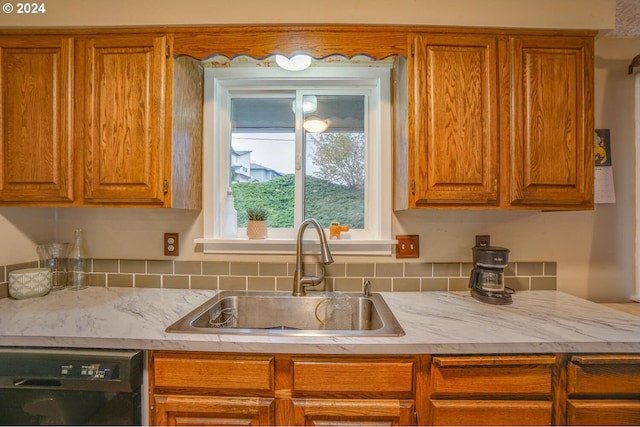 kitchen with dishwasher and sink