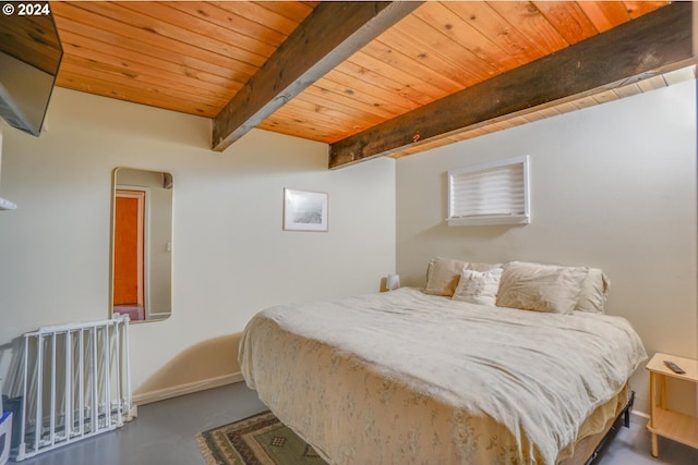 bedroom with concrete floors, wooden ceiling, and beam ceiling