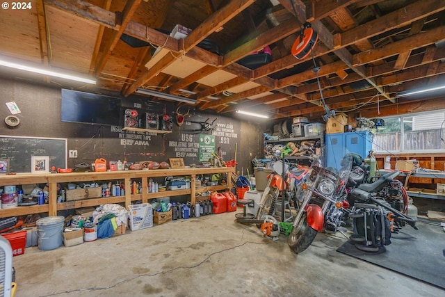 garage with a workshop area