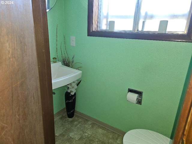 bathroom with sink and toilet