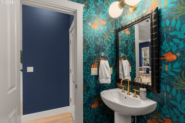 bathroom featuring hardwood / wood-style flooring and sink