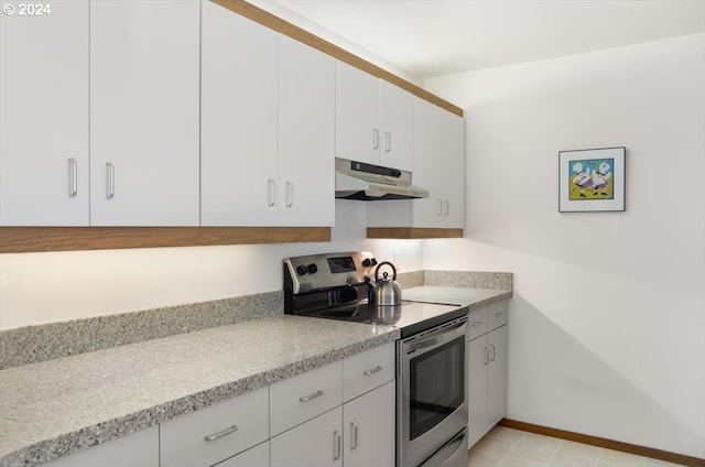 kitchen with white cabinetry and stainless steel range with electric stovetop