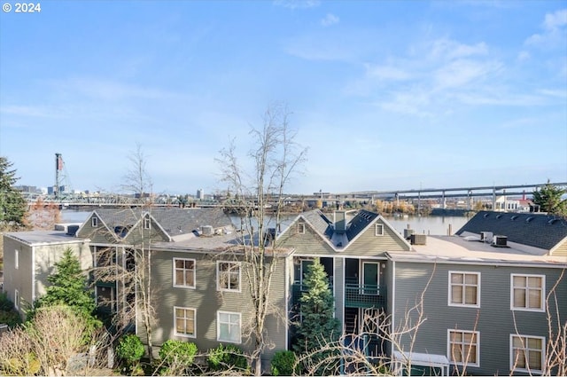 property's view of city with a water view