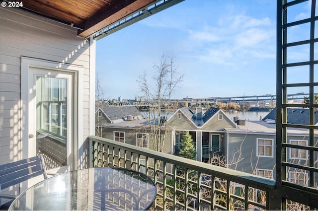 balcony featuring a water view