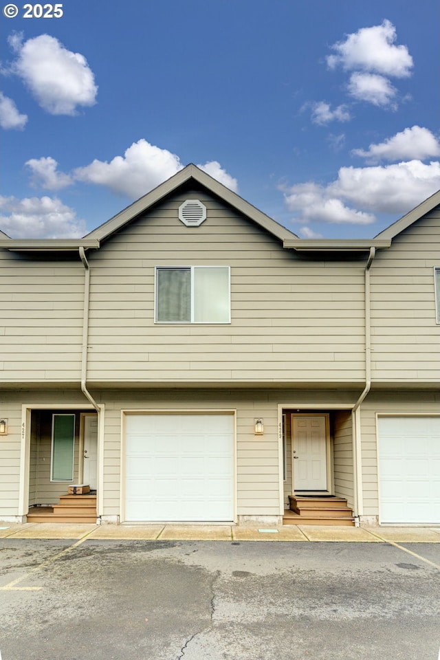 view of property featuring a garage