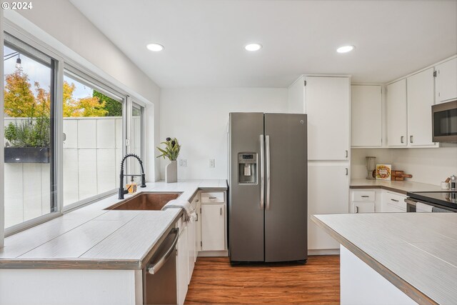 dining space with a chandelier and an AC wall unit