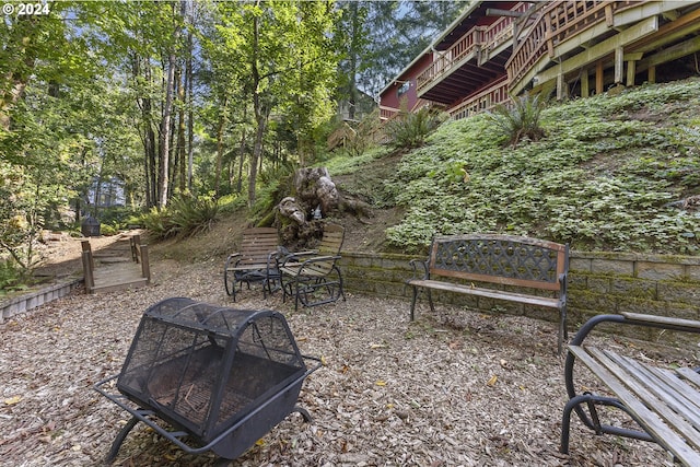 view of patio / terrace featuring a fire pit