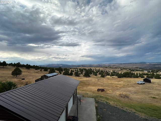 drone / aerial view with a rural view and a mountain view