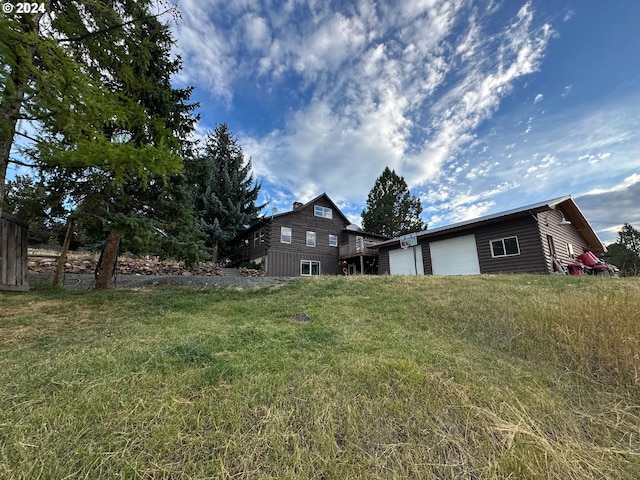 view of yard featuring a garage