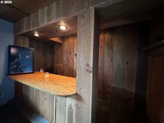 bar with a bar and wood walls