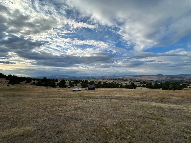 exterior space featuring a rural view and a mountain view