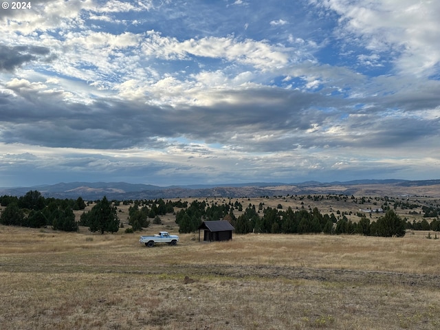 property view of mountains with a rural view