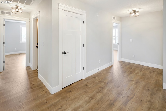 hall featuring hardwood / wood-style flooring