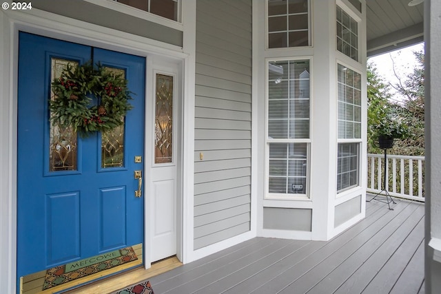 entrance to property with a porch