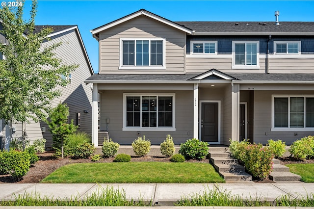 view of front of property with a front lawn