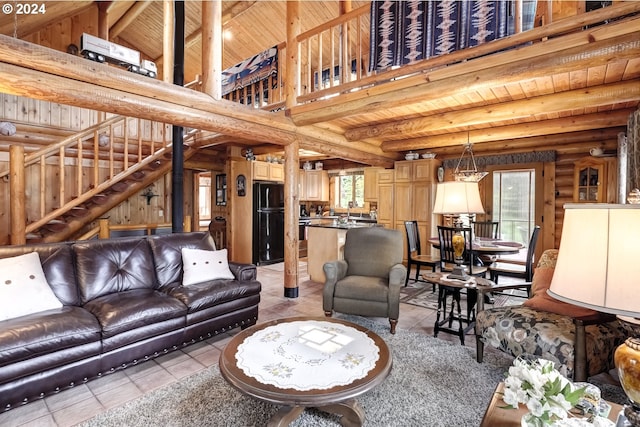 living room with wooden ceiling, rustic walls, light tile floors, and a high ceiling