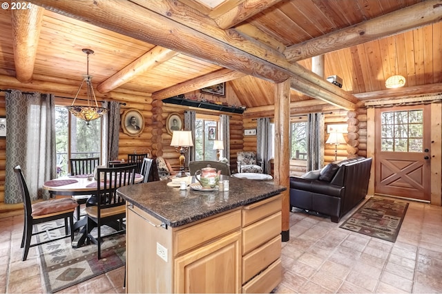 kitchen featuring rustic walls, hanging light fixtures, wooden ceiling, and light tile flooring