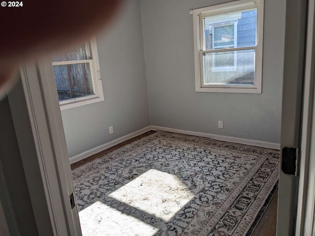 empty room featuring hardwood / wood-style floors