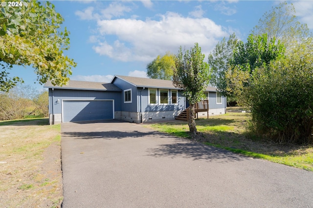 ranch-style house with a garage