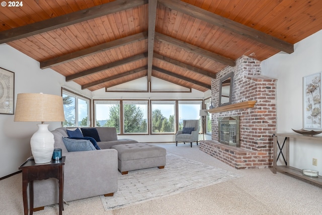 living area with vaulted ceiling with beams, wood ceiling, carpet flooring, and a fireplace