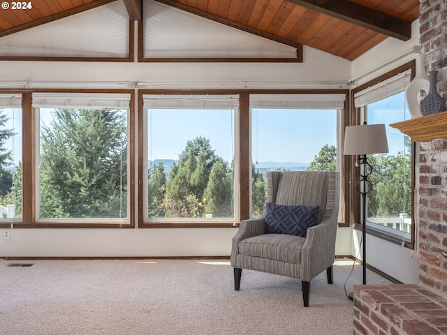 sunroom with wood ceiling and vaulted ceiling with beams