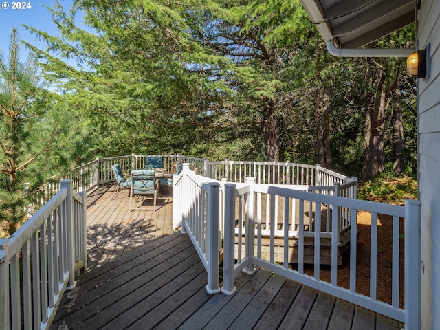 deck featuring outdoor dining space