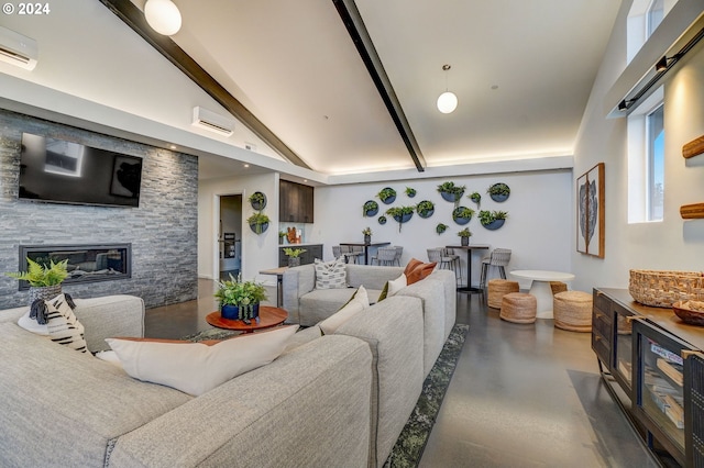 living room with vaulted ceiling with beams, a large fireplace, concrete flooring, and an AC wall unit