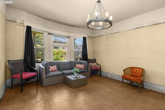 living area with an inviting chandelier