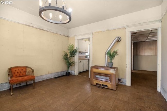 interior space featuring a notable chandelier and dark hardwood / wood-style floors