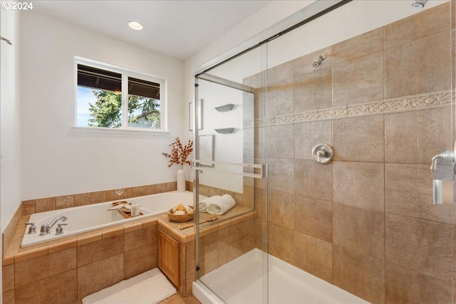 bathroom with independent shower and bath