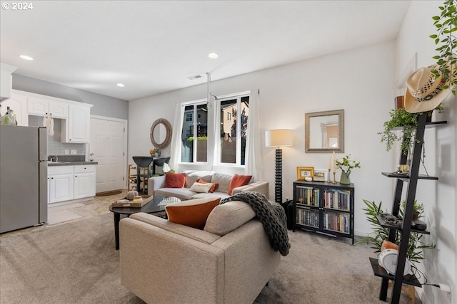 living room with light carpet