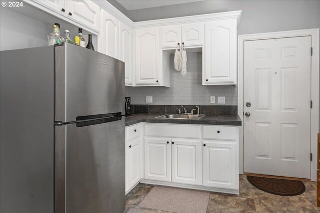 carpeted living room featuring sink