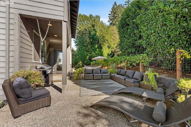 view of patio / terrace featuring area for grilling and outdoor lounge area