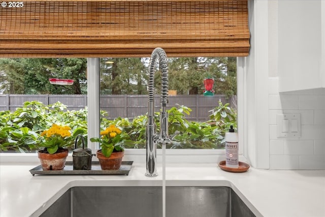 details with light countertops and a sink