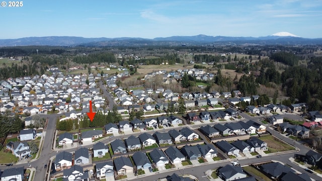 bird's eye view with a residential view and a mountain view