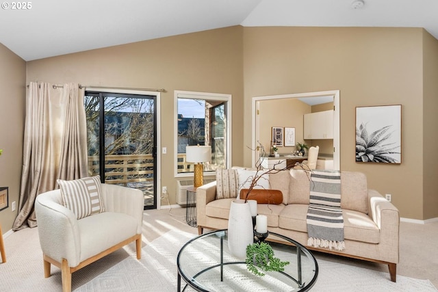 living room featuring light carpet and lofted ceiling